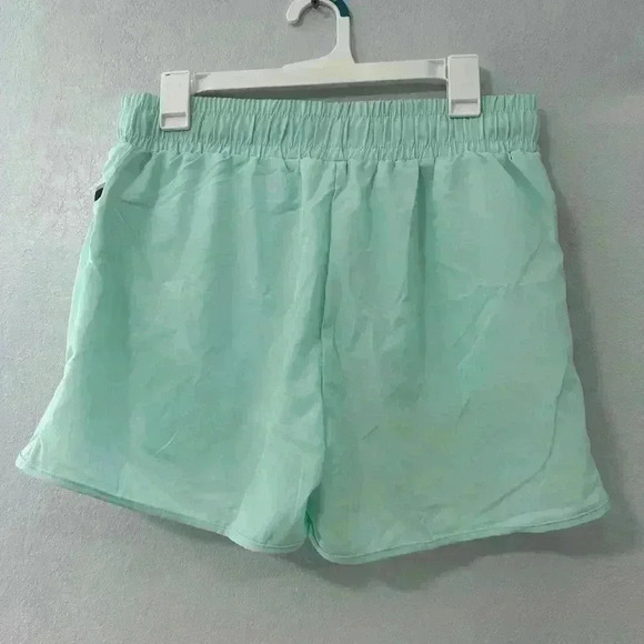 117. Oalka Women's Quick Dry Running Shorts Lined Workout Shorts with Pocket - Picture 6 of 6